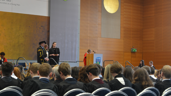 President Andrew Deeks gives student award